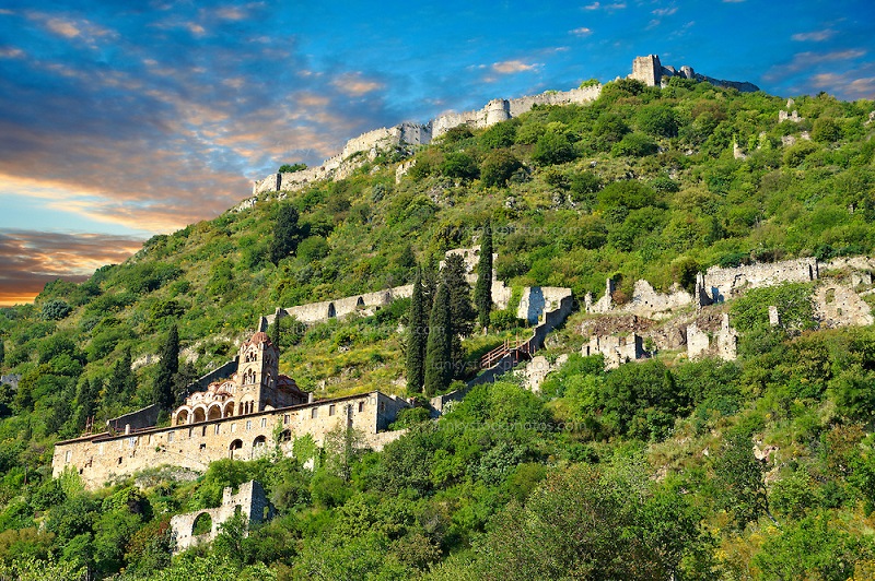 View of Mystras looking up towards the castle fortifications and the Byzantine Othodox monastery of Pantanassa , Mystras , Sparta, the Peloponnese, Greece. A UNESCO World Heritage Site