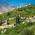 View of Mystras looking up towards the castle fortifications  and the Byzantine Othodox monastery of Pantanassa ,  Mystras ,  Sparta, the Peloponnese, Greece. A UNESCO World Heritage Site